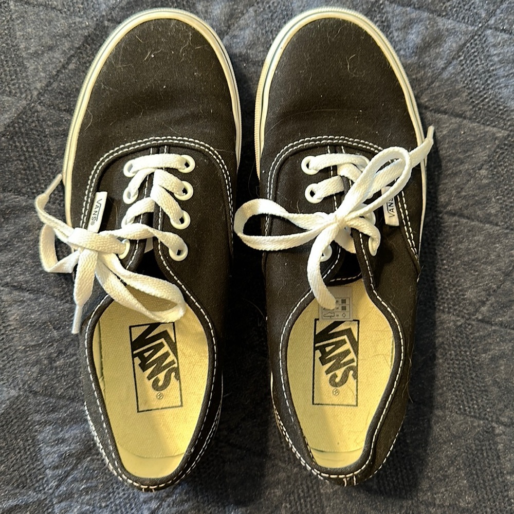 Vans. Canvas sneaker. Size 6.5 (women), 5 (mens). Worn twice.